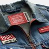 Levi_sxMcLarenRacingHeritageTruckerJacketWomen